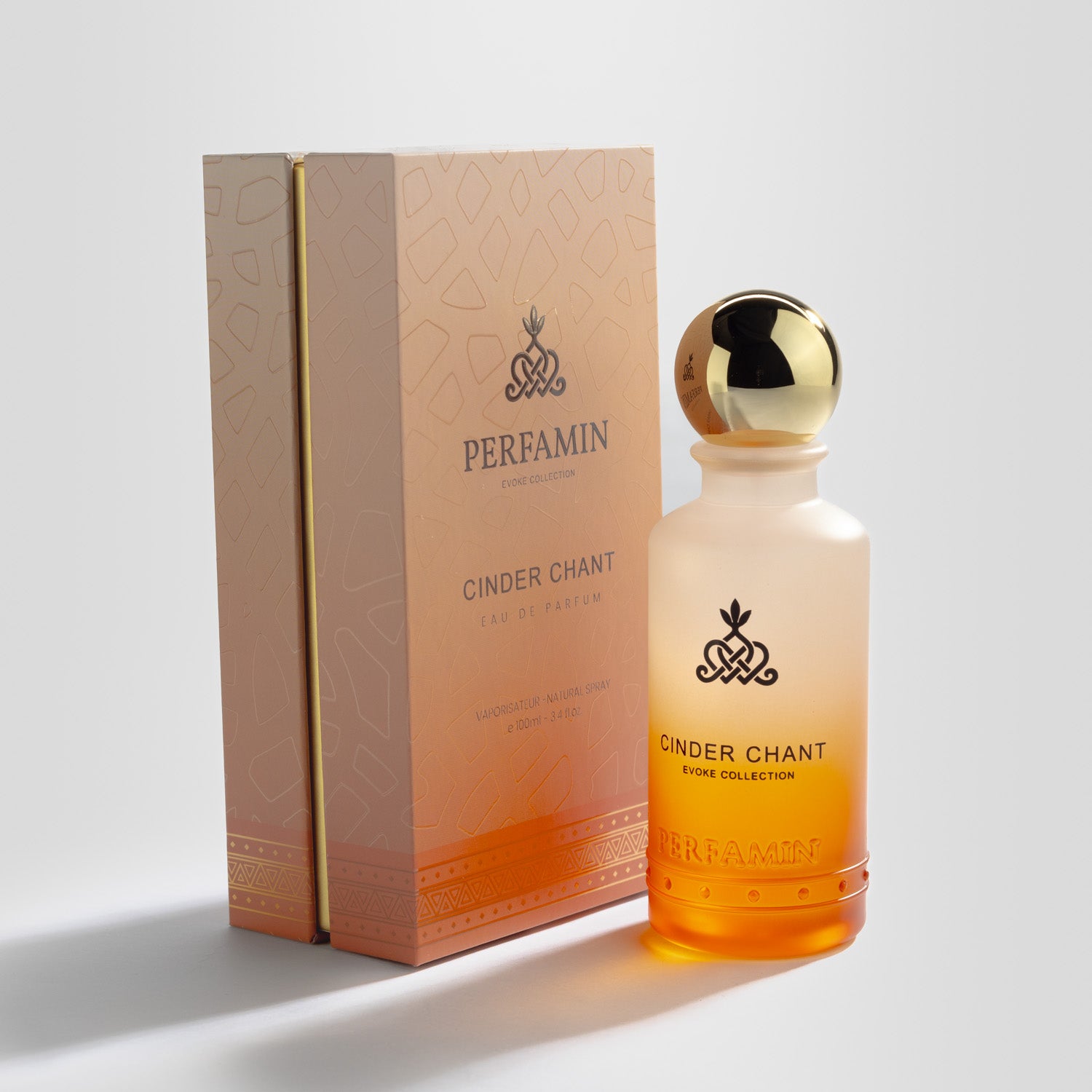 Cinder Chant magnetic signature cologne bottle and packaging - a warm scent designed to attract.