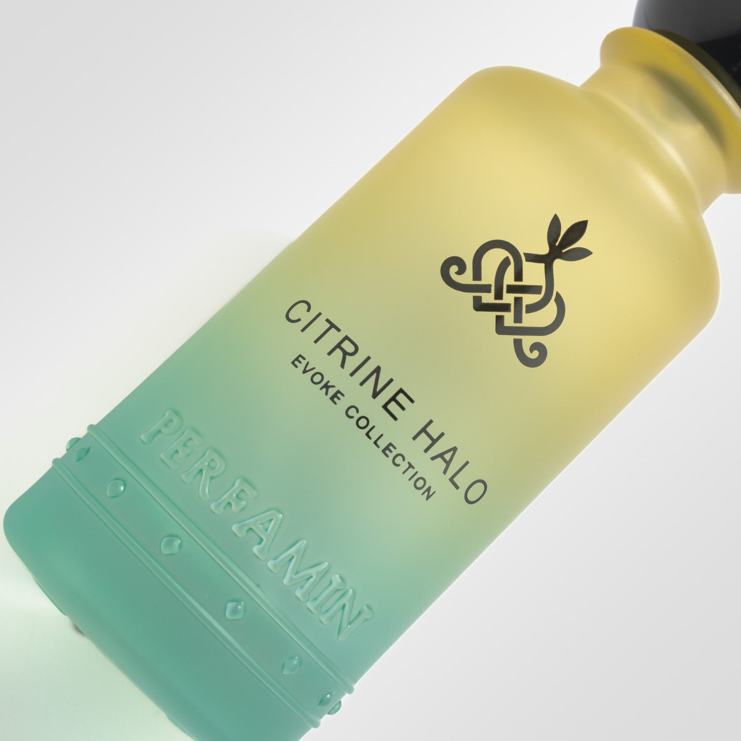 Citrine Halo perfume bottle close-up with Perfamin branding