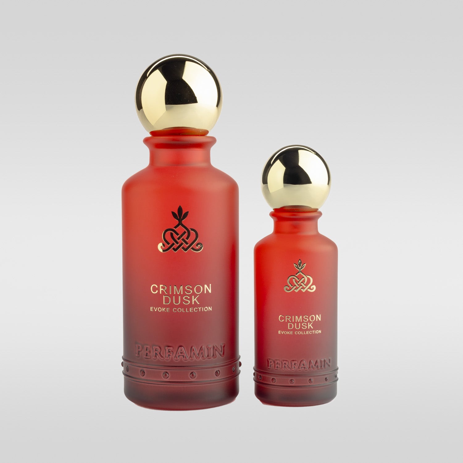 Crimson Dusk Eau de Parfum shown in 30ml and 100ml bottle sizes