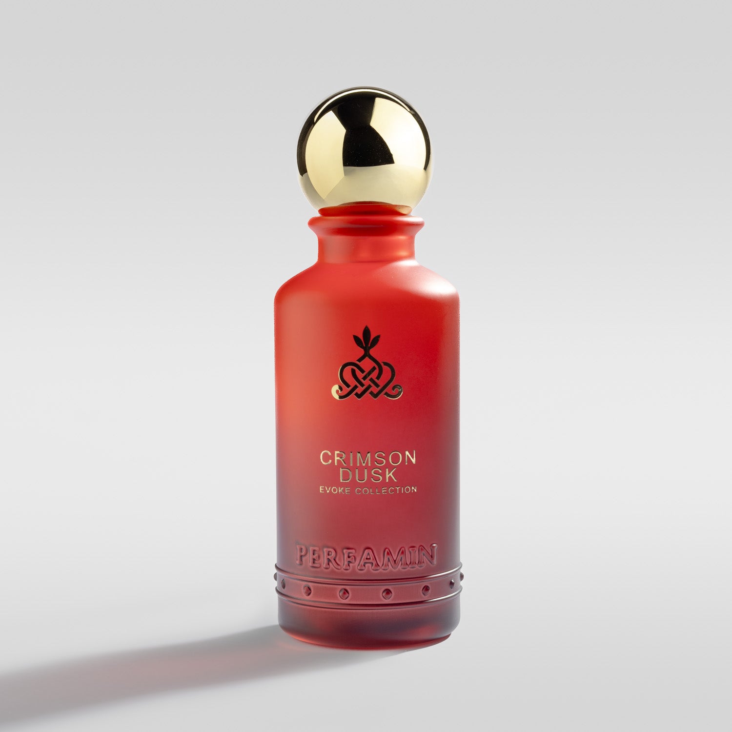 Crimson Dusk vanilla caramel and rose perfume bottle by Perfamin