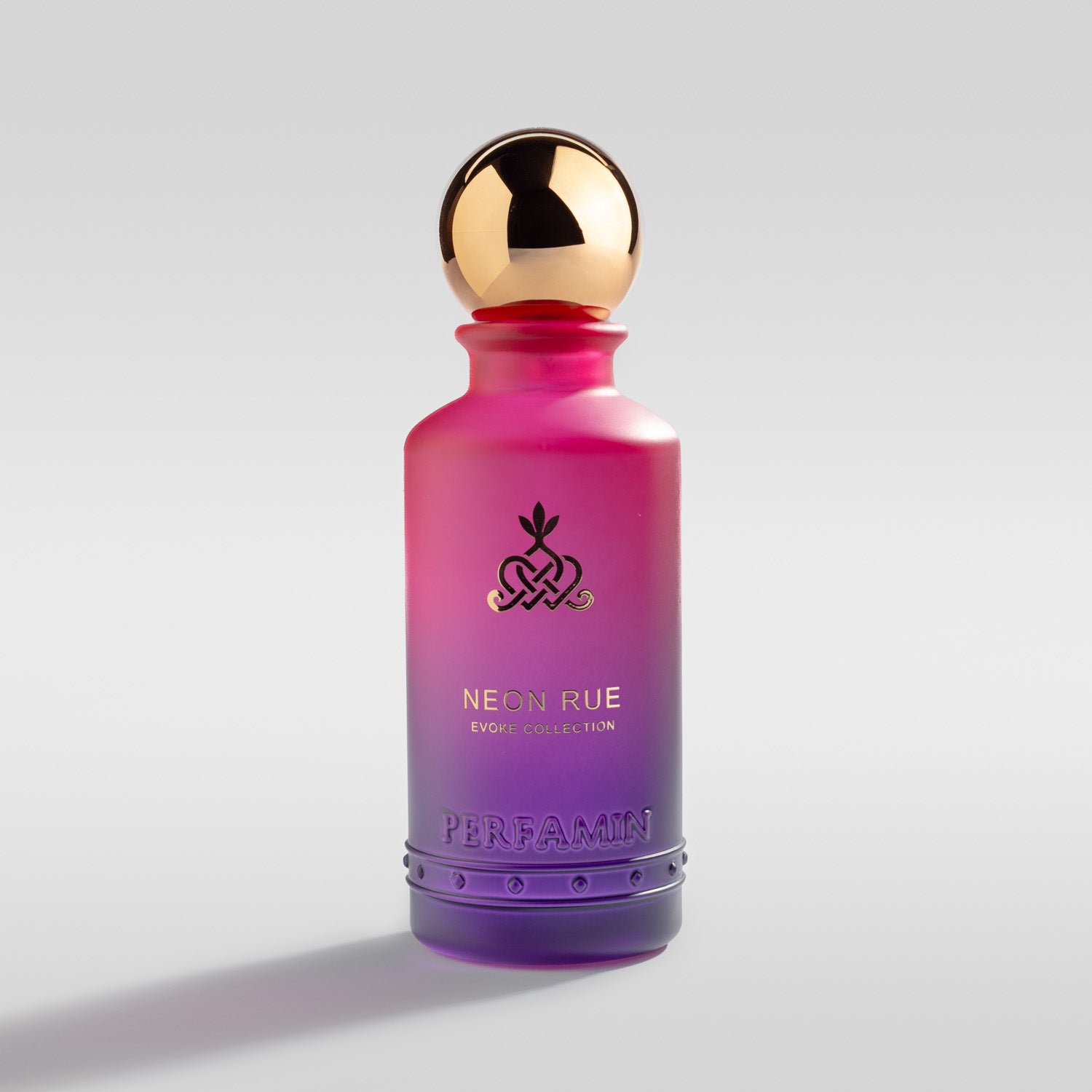 Neon Rue strawberry raspberry and violet perfume bottle by Perfamin