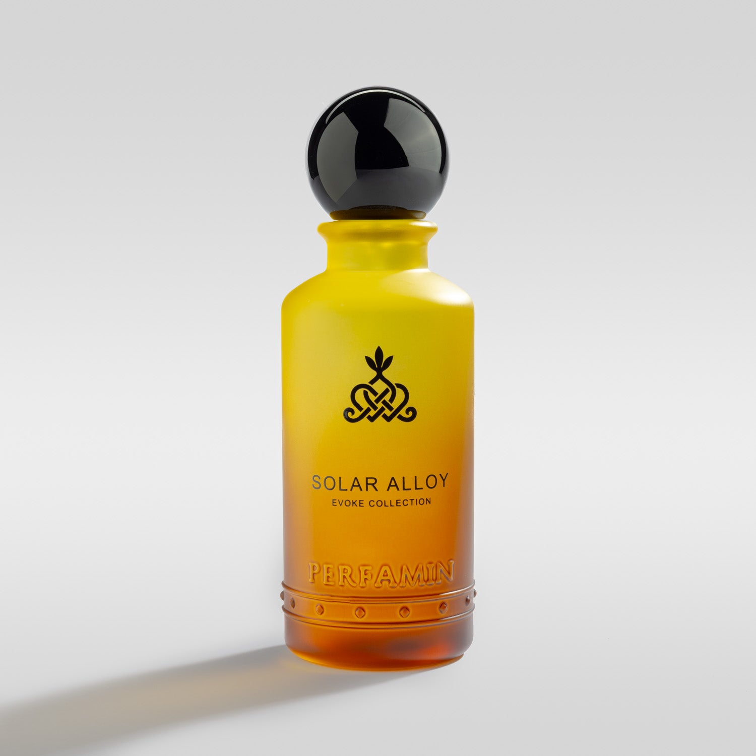 Solar Alloy men’s amber woody perfume bottle by Perfamin with grapefruit, cinnamon, amber and tonka bean notes