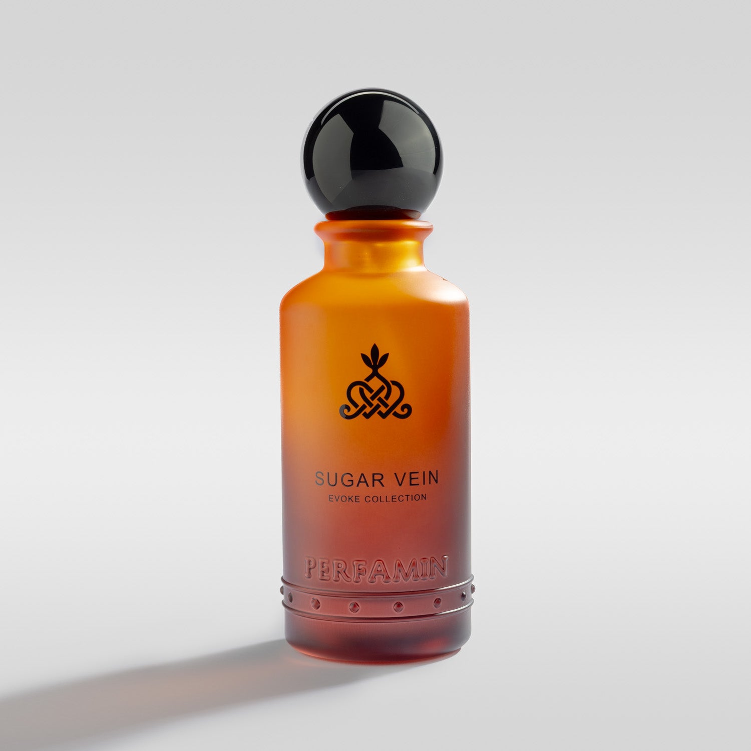 Sugar Vein feminine gourmand perfume bottle by Perfamin with praline, vanilla, patchouli and orange flower notes